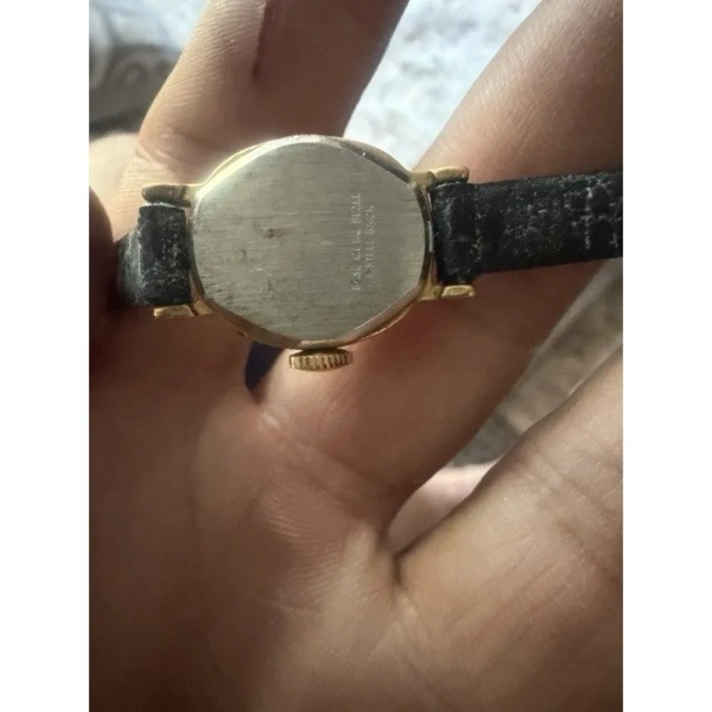 Women's Dress Analog Wristwatch Gold Tone White Dial Arabic Black Leather